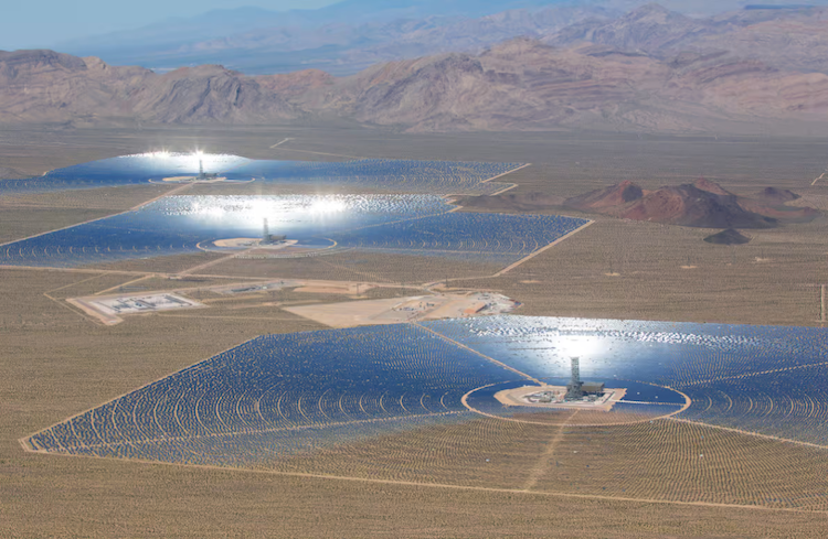 At each of the three towers at Ivanpah, heat from mirrors concentrating sunlight is focused up to a solar receiver. Water transfers the heat to a steam cycle power block at each base.